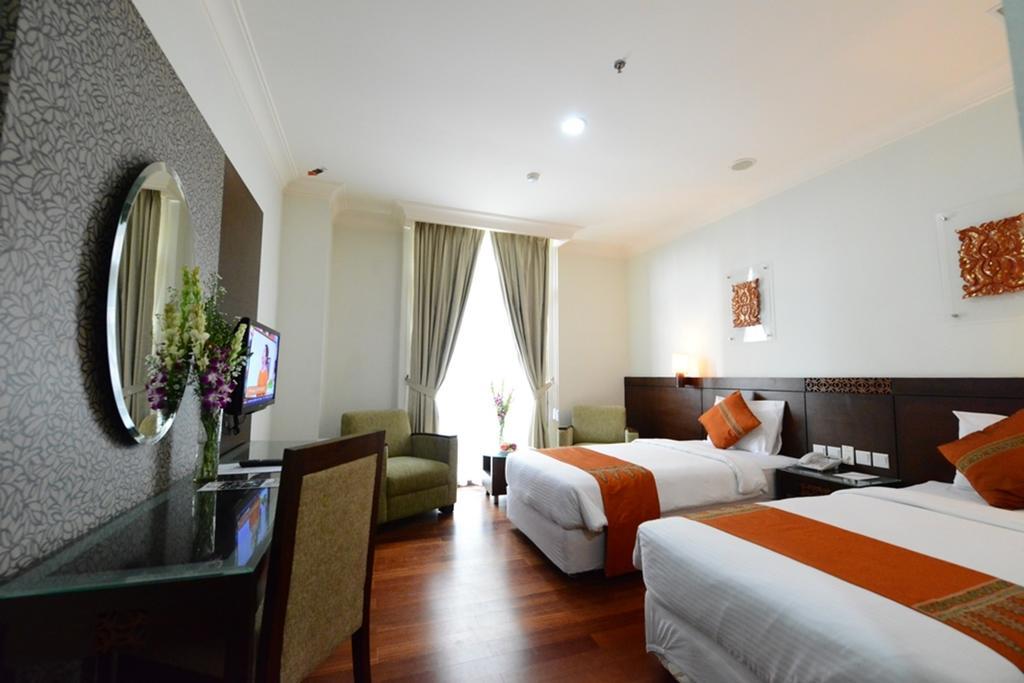 Amazing Kutaradja Hotel Джакарта Стая снимка